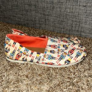 size 7.5 nutcracker Christmas Toms. Worn once and in excellent condition!